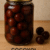 Frasco artesanal de cocoyol en dulce campechano, receta tradicional con almíbar y presentación ideal para emprendimiento local.